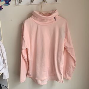Pink turtleneck under armour sweatshirt
